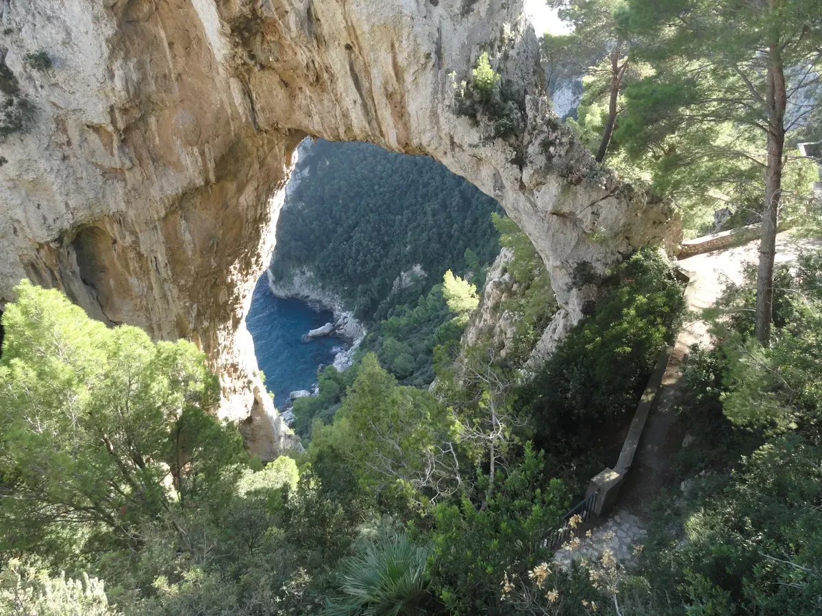 The Arco Naturale natural rock arch on the east coast of Capri passed on a Capri boat tour with swim stop, Italy