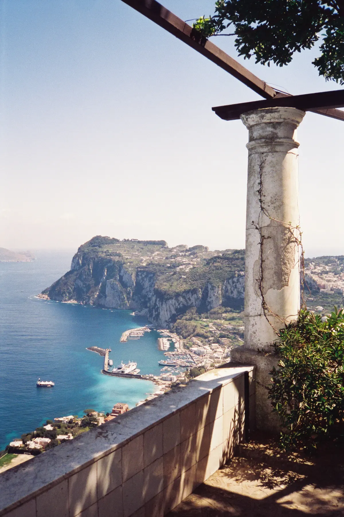 Marina Grande harbour seen from above near Villa San Michele on Capri, where the caves swim and limoncello boat tour starts, Italy
